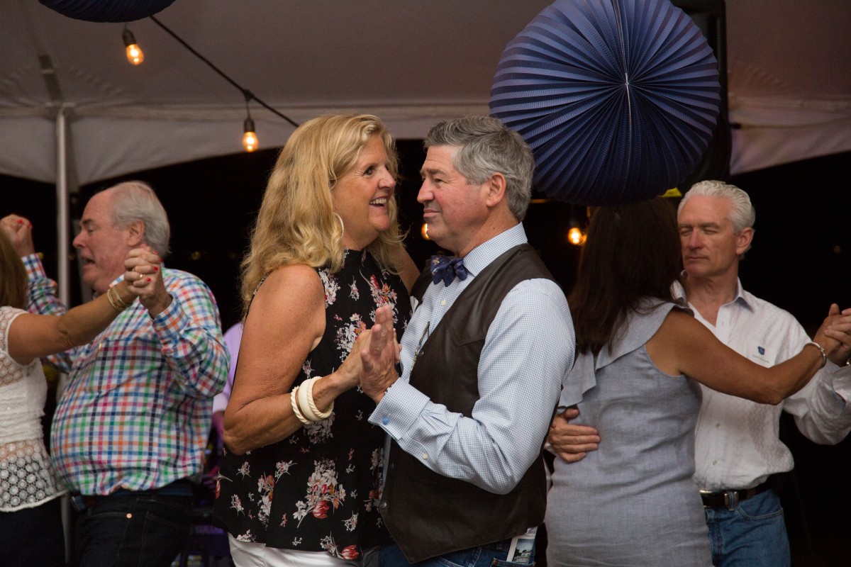 Couple dancing at previous Denim Ball. Photo by Kathryn Ray