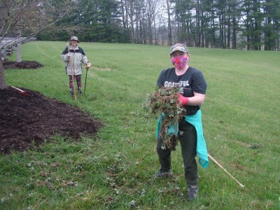 Vounteers help clear fallen branches at the Blue Ridge Music Center