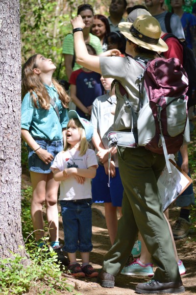 A ranger leads kids on a hike during National Park Rx Day.