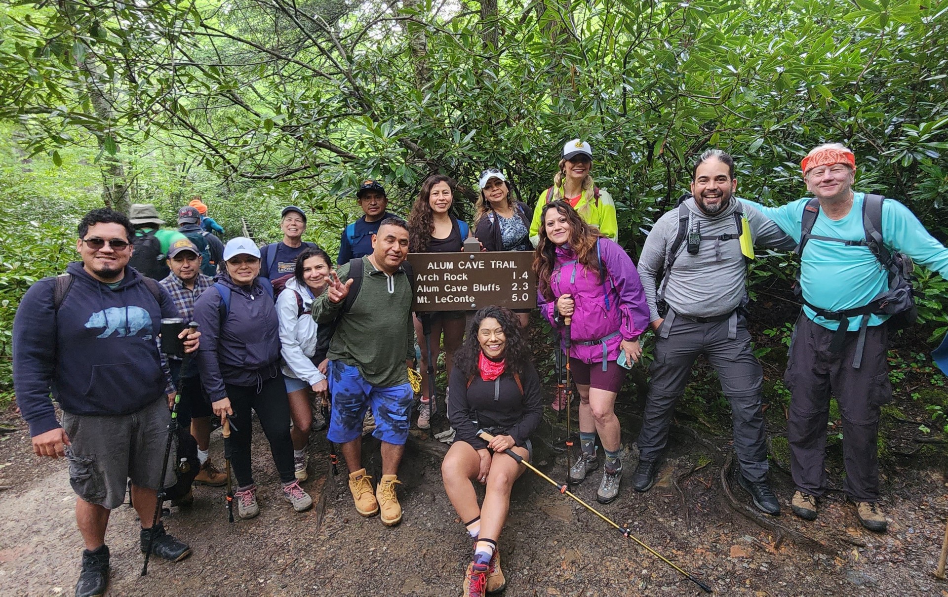Latinos Aventureros en las Carolinas starting Alum Cave Trail, using hiking sticks from "El Closet."