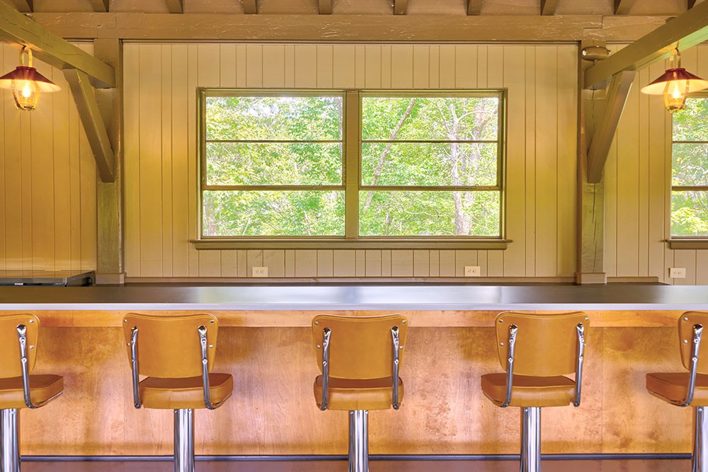 Gold stools line the lunch counter at The Bluffs Restaurant