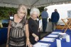 Jenny Miller and Betty Lou Miller look at silent auction table